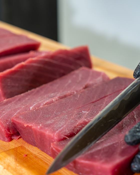 Tuna being sliced by hand at SHO